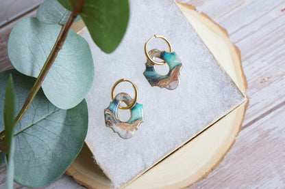 Unique handcrafted earrings with ocean stone pattern