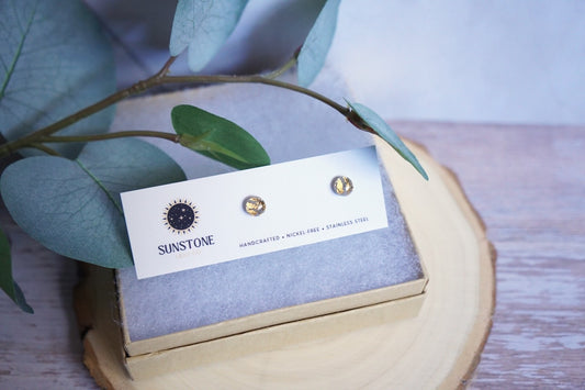 Handcrafted gold circle stud earrings in 6mm displayed on Sunstone Clay Co card.