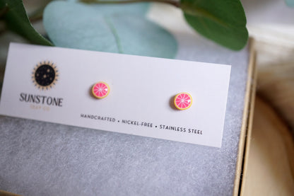 Everyday minis grapefruit stud earrings displayed on jewelry card
