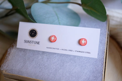 Handcrafted tomato slice stud earrings on Sunstone Clay Co display card