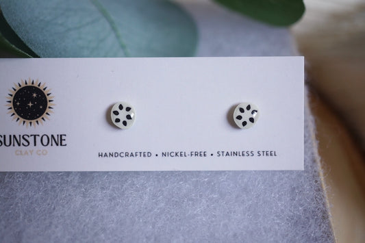 Handcrafted soursop slice stud earrings on Sunstone Clay Co display card