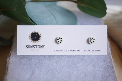 Handcrafted soursop slice stud earrings on Sunstone Clay Co display card