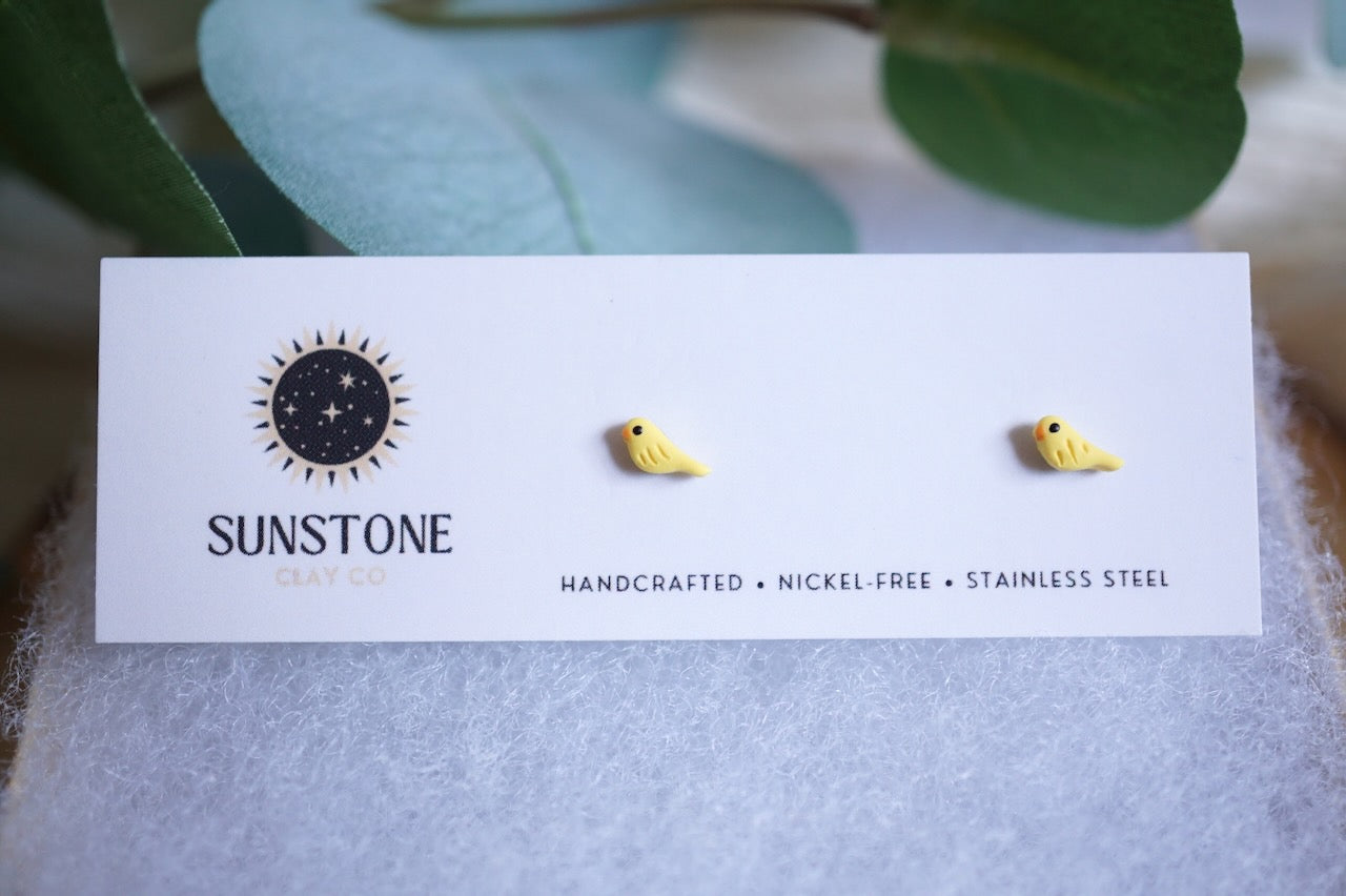 Tiny yellow bird stud earrings with stainless steel posts