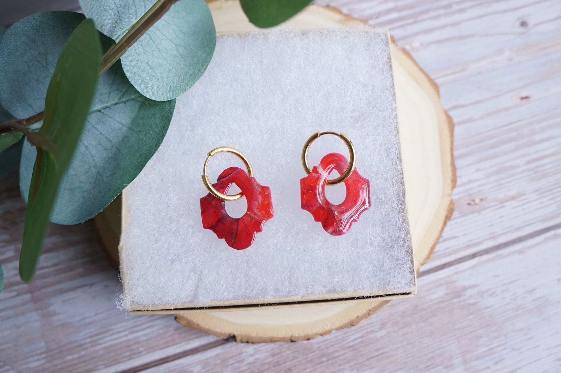 Handmade crimson earrings with marbled stone effect