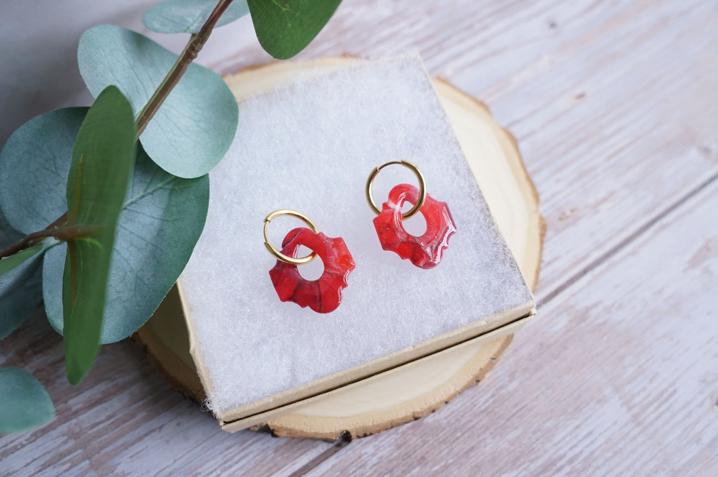 Bold red statement earrings with lightweight design
