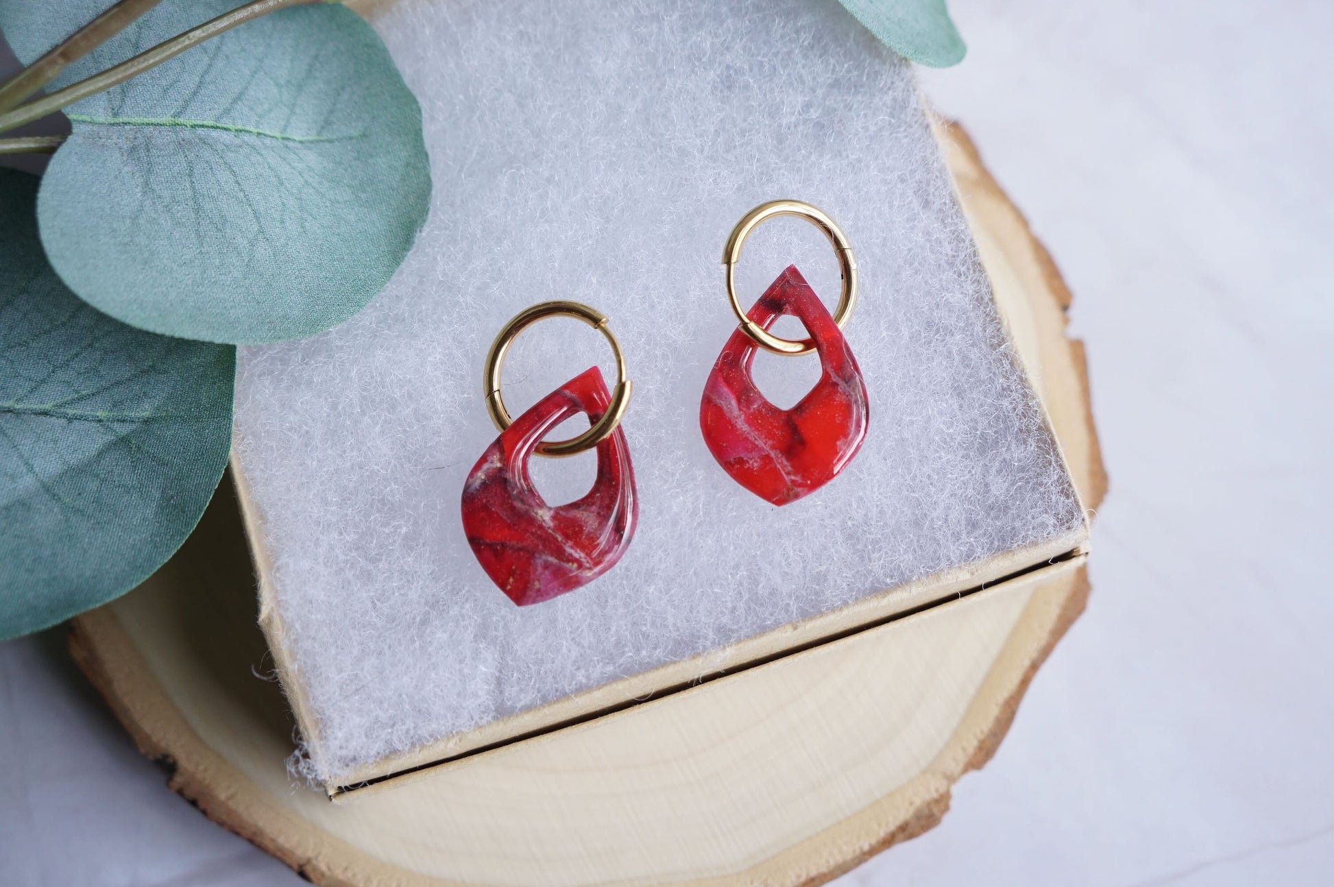 Handmade crimson earrings with marbled stone effect