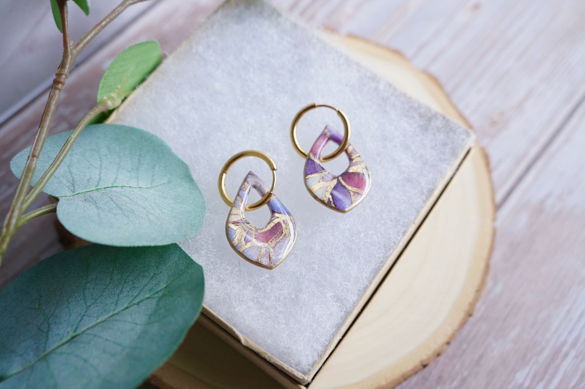 Artisan polymer clay earrings in soft pastel tones