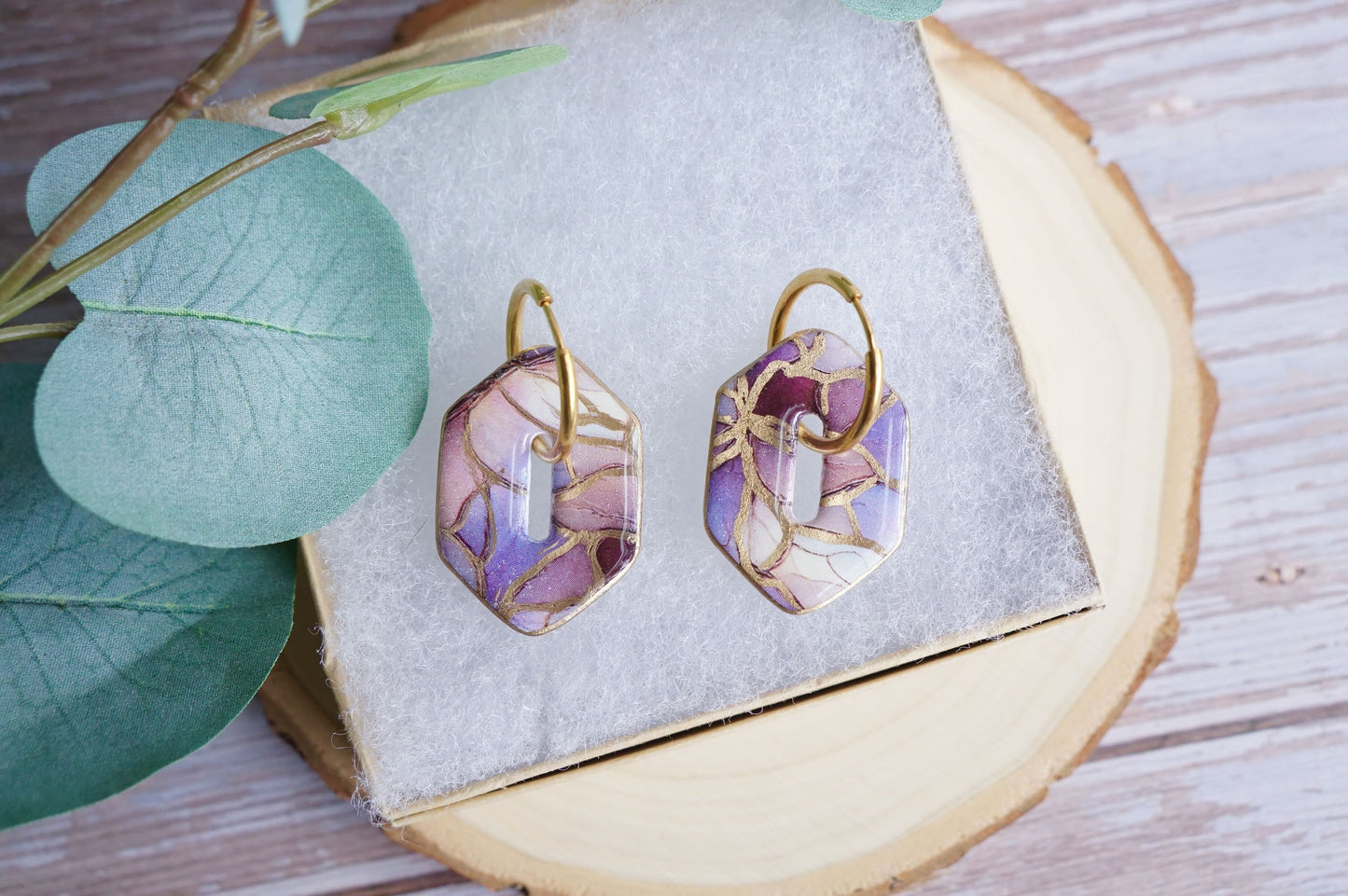 Artisan polymer clay earrings in soft pastel tones