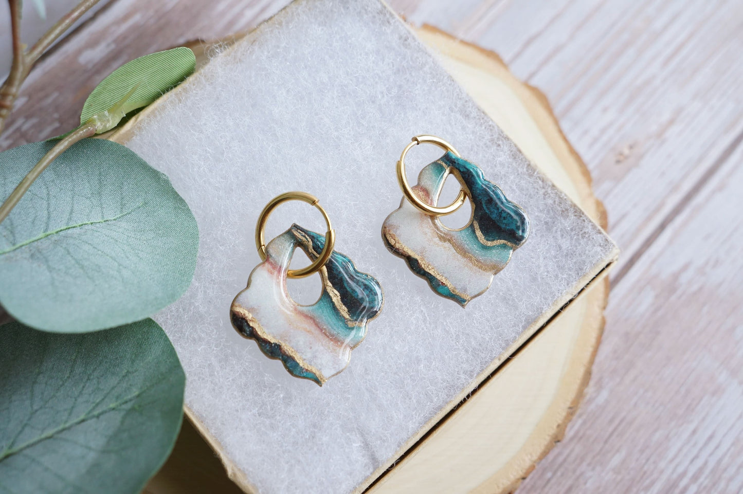 Lightweight polymer clay dangle earrings with marbled teal design